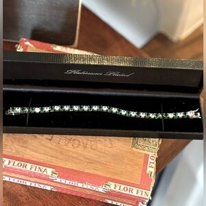 Gold Coast Bracelet. Platinum Plated Emerald Colored Cubic Zirconium w/Box NWOT